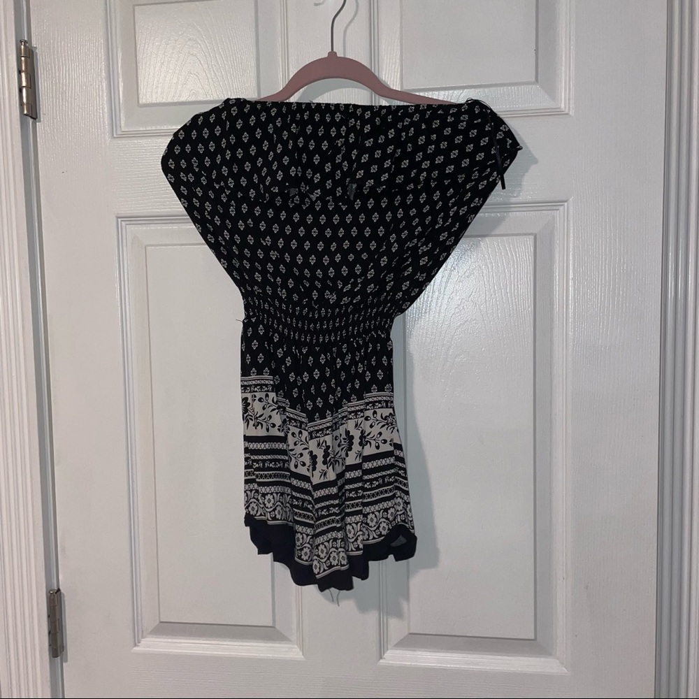 size small black and white pattern romper, worn once